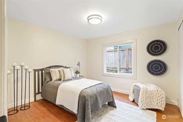 bedroom featuring hardwood / wood-style floors