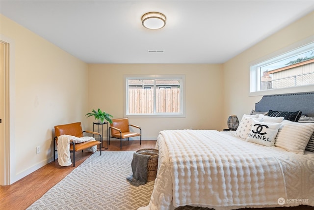 bedroom featuring hardwood / wood-style floors