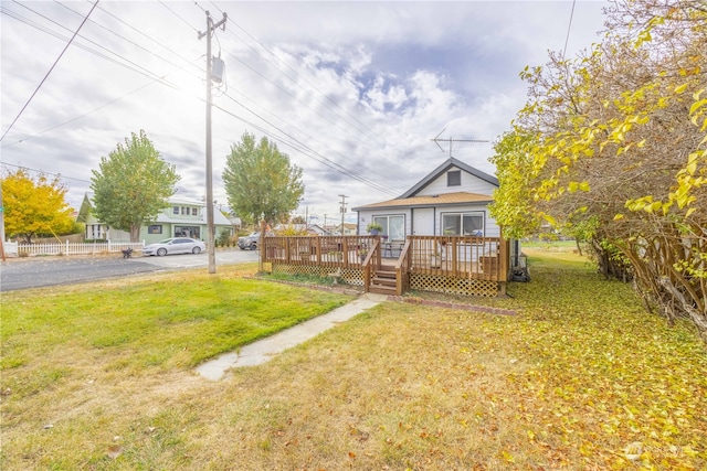 view of yard with a deck