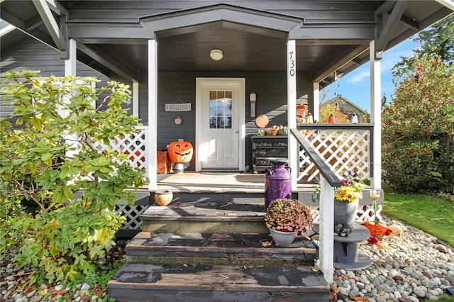 doorway to property featuring a porch