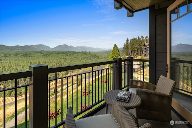 balcony featuring a mountain view