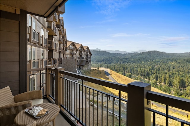 balcony featuring a mountain view