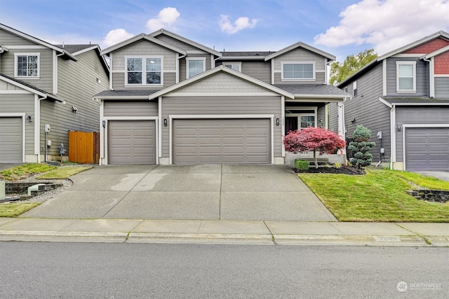 craftsman inspired home with a garage