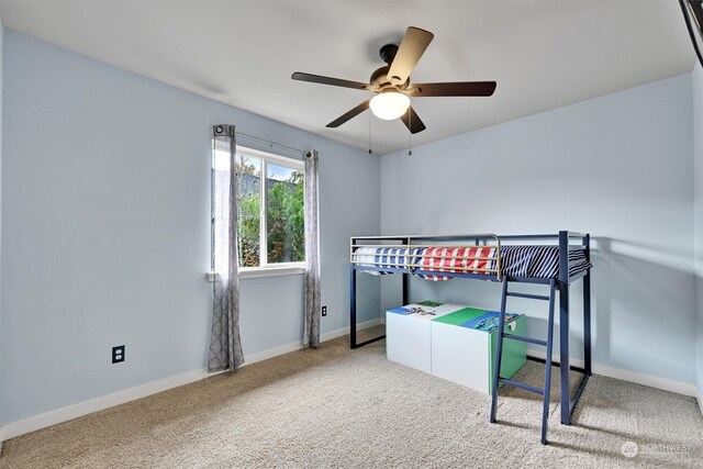 bedroom featuring carpet floors and ceiling fan