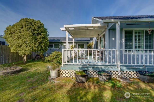 exterior space with a yard and a deck