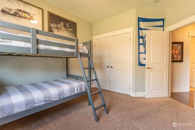 carpeted bedroom featuring a closet