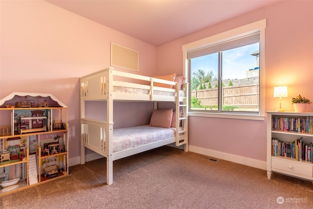 bedroom featuring carpet