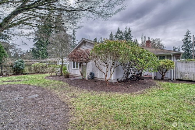 view of yard with fence