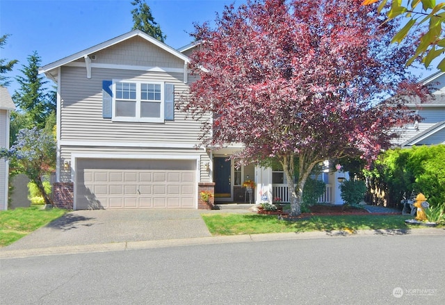 view of property hidden behind natural elements with a garage