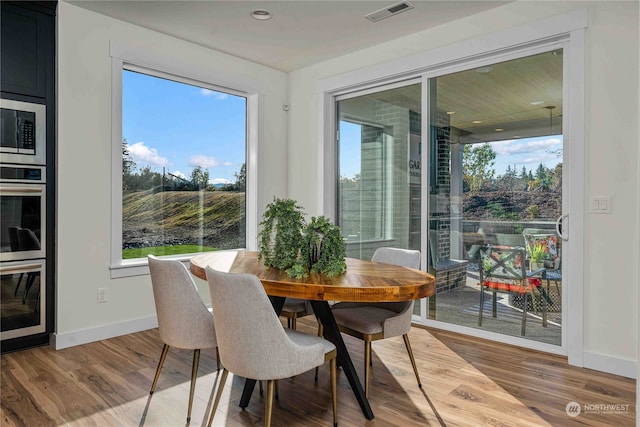 dining area featuring light hardwood / wood-style floors