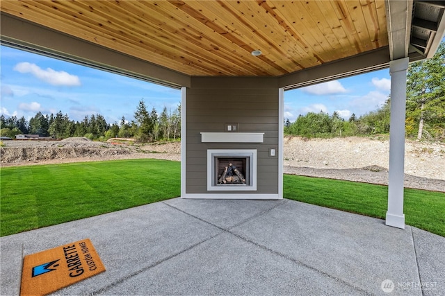 25709 64th Avenue Ct E Unit 7, Graham, WA 98338 - view of patio featuring a fireplace