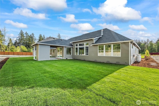 25709 64th Avenue Ct E Unit 7, Graham, WA 98338 - back of house featuring roof with shingles and a patio