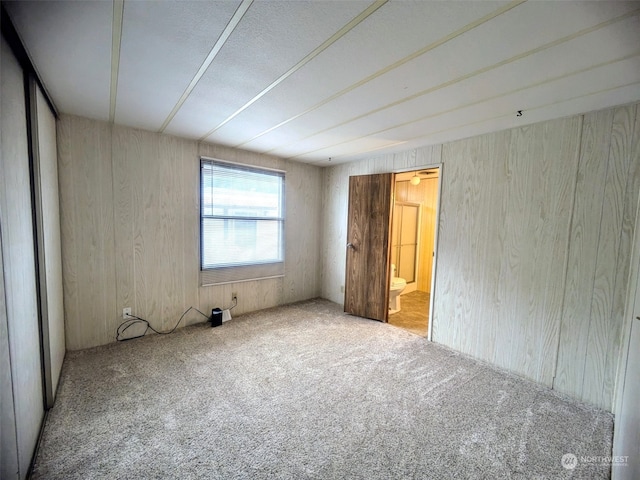 spare room featuring carpet