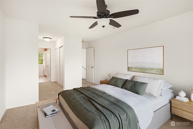 carpeted bedroom with ceiling fan