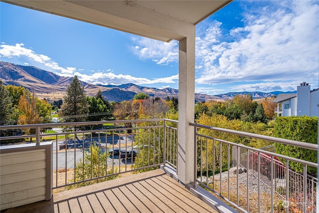 balcony featuring a mountain view