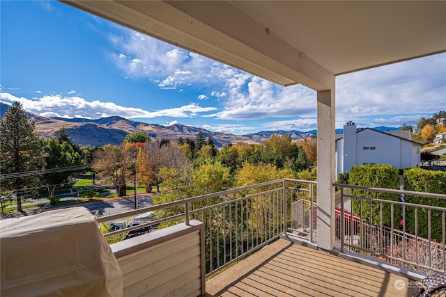 balcony with a mountain view and grilling area