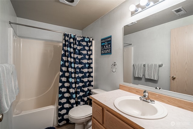 full bathroom featuring vanity, toilet, and shower / tub combo with curtain