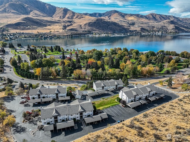 drone / aerial view of a water and mountain view