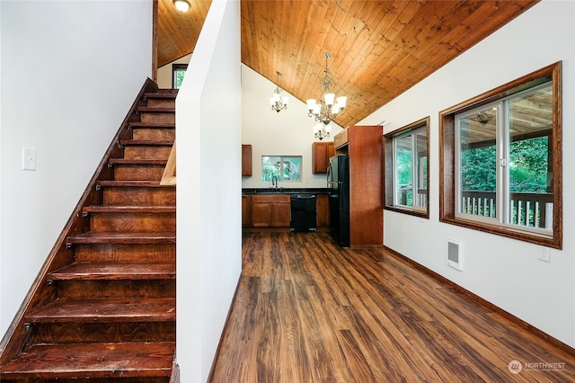 stairs with sink, high vaulted ceiling, wood-type flooring, wood ceiling, and a chandelier