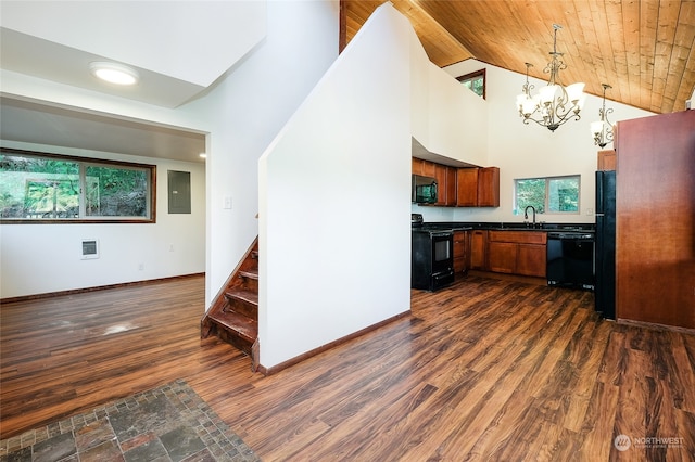 kitchen with an inviting chandelier, black appliances, wooden ceiling, high vaulted ceiling, and pendant lighting