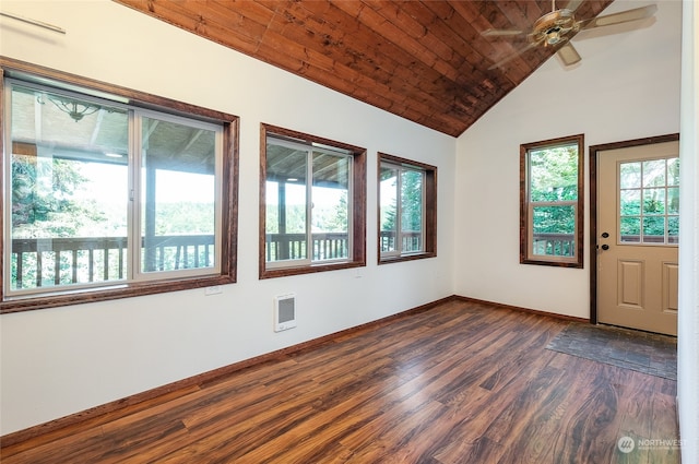 foyer entrance with dark wood-type flooring, ceiling fan, vaulted ceiling, and wood ceiling