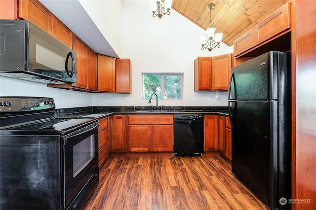 kitchen with wooden ceiling, sink, black appliances, dark hardwood / wood-style floors, and decorative light fixtures