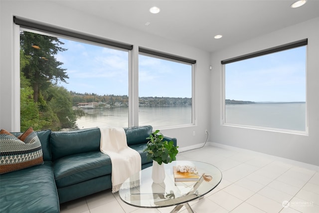 sunroom with a water view