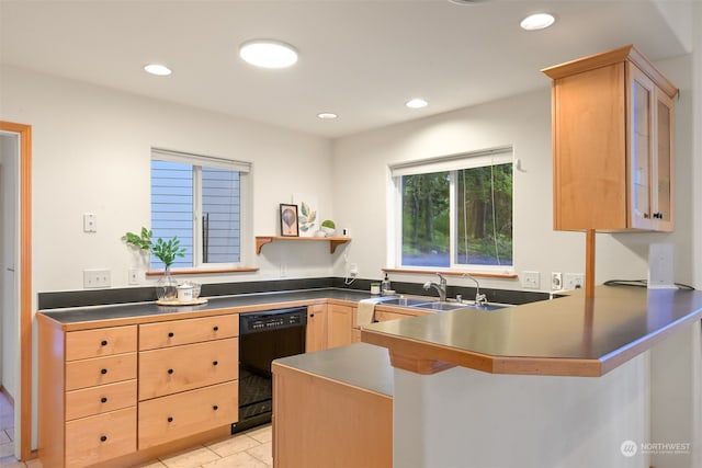 kitchen featuring light brown cabinets, kitchen peninsula, dishwasher, and sink