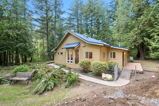 rear view of house with a deck