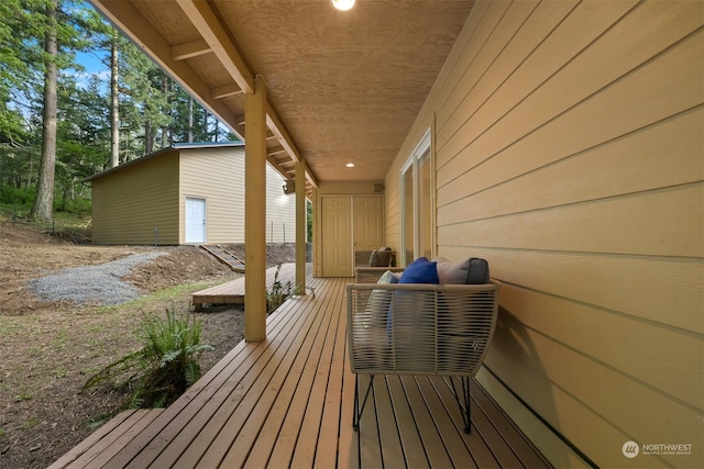 view of sauna / steam room featuring wooden walls and hardwood / wood-style flooring