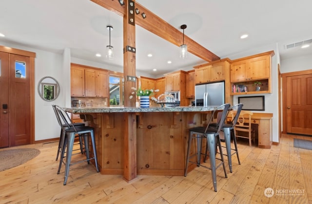 kitchen with visible vents, recessed lighting, stainless steel fridge with ice dispenser, light wood-style floors, and beamed ceiling