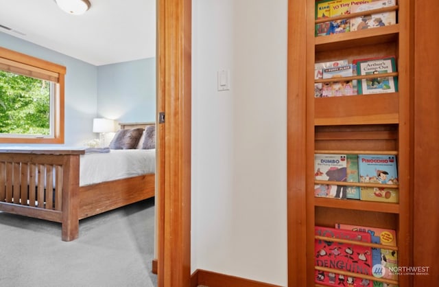 bedroom with visible vents and carpet floors