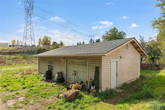 view of outdoor structure with a garage