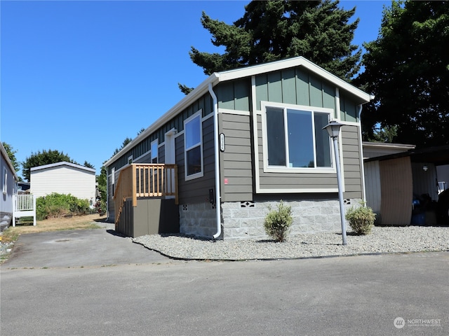 view of front of home with a wooden deck