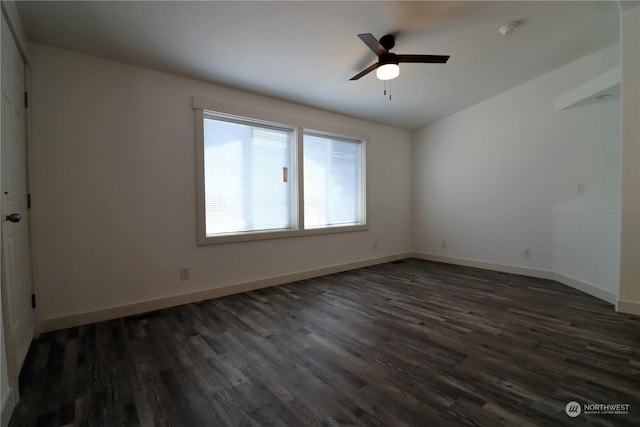 1111 Archwood Dr SW Unit 324, Olympia, WA 98502 - unfurnished room featuring dark wood finished floors, ceiling fan, a smoke detector, and baseboards