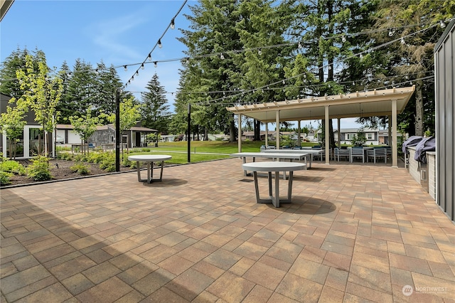 surrounding community featuring a yard and a patio