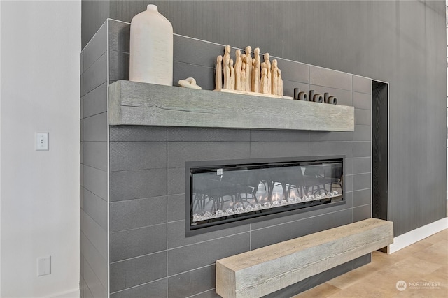 1111 Archwood Dr SW Unit 324, Olympia, WA 98502 - detailed view of baseboards and a glass covered fireplace