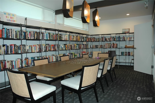 dining space with dark carpet