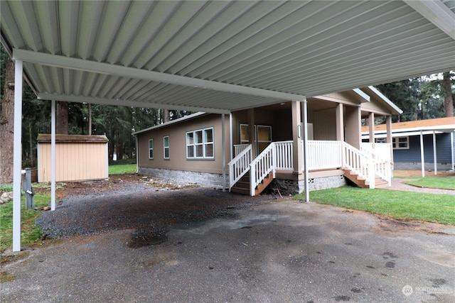 exterior space with a shed and covered porch