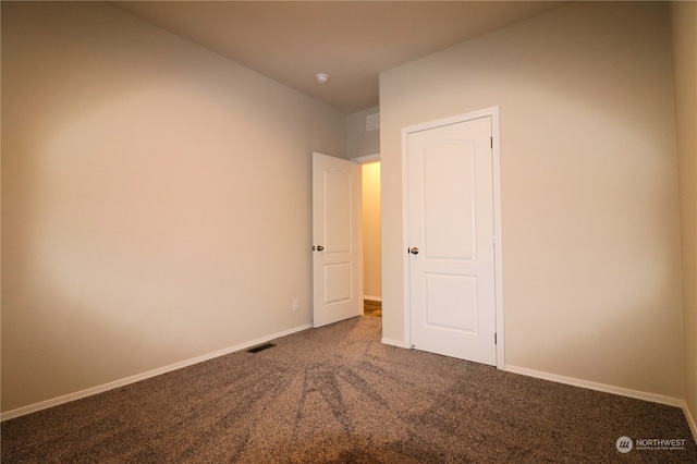 unfurnished bedroom with carpet flooring