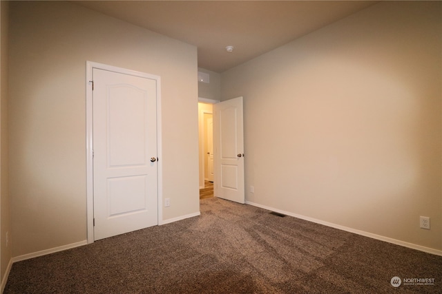 unfurnished bedroom with carpet flooring