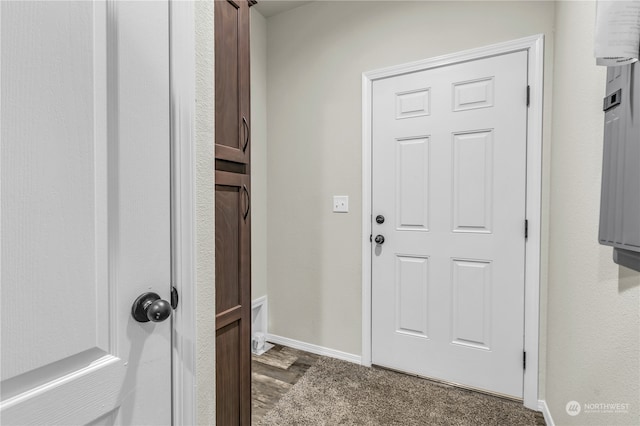 doorway to outside with dark wood-type flooring