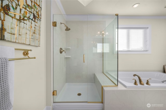 bathroom featuring crown molding and independent shower and bath