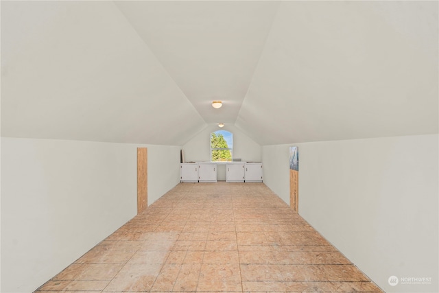 bonus room featuring lofted ceiling