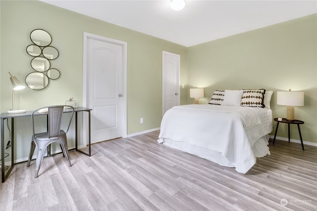 bedroom featuring light hardwood / wood-style floors