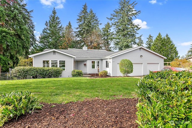 single story home featuring a garage and a front lawn