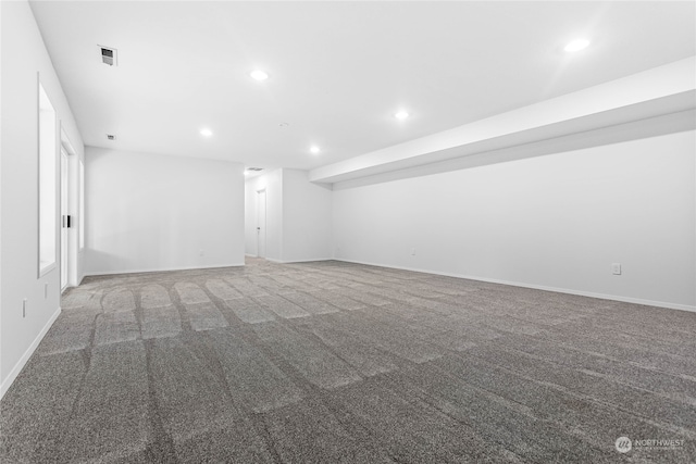 empty room featuring carpet flooring