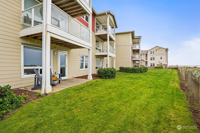 exterior space with a patio area and a balcony