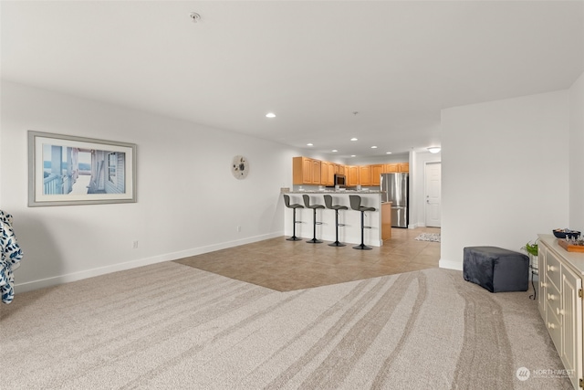 living room featuring light colored carpet