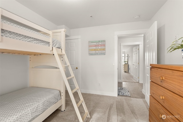 bedroom with light tile patterned floors